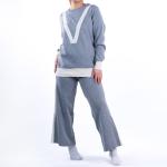 Stylish knitted suit set with white "V" design on the front
