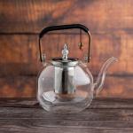 Elegant glass teapot with Silver infuser and wooden handle