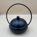 Metal incense burner with handle and lid
