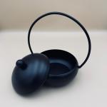 Metal incense burner with handle and lid