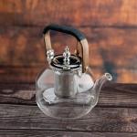 Elegant glass teapot with Silver infuser and wooden handle